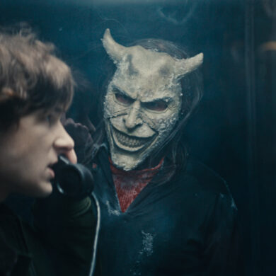 (from left) Finn (Mason Thames) and The Grabber (Ethan Hawke) in Black Phone 2, written and directed by Scott Derrickson. © 2025 Universal Studios. All Rights Reserved.
