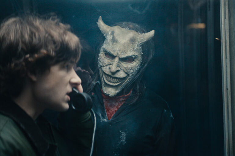 (from left) Finn (Mason Thames) and The Grabber (Ethan Hawke) in Black Phone 2, written and directed by Scott Derrickson. © 2025 Universal Studios. All Rights Reserved.